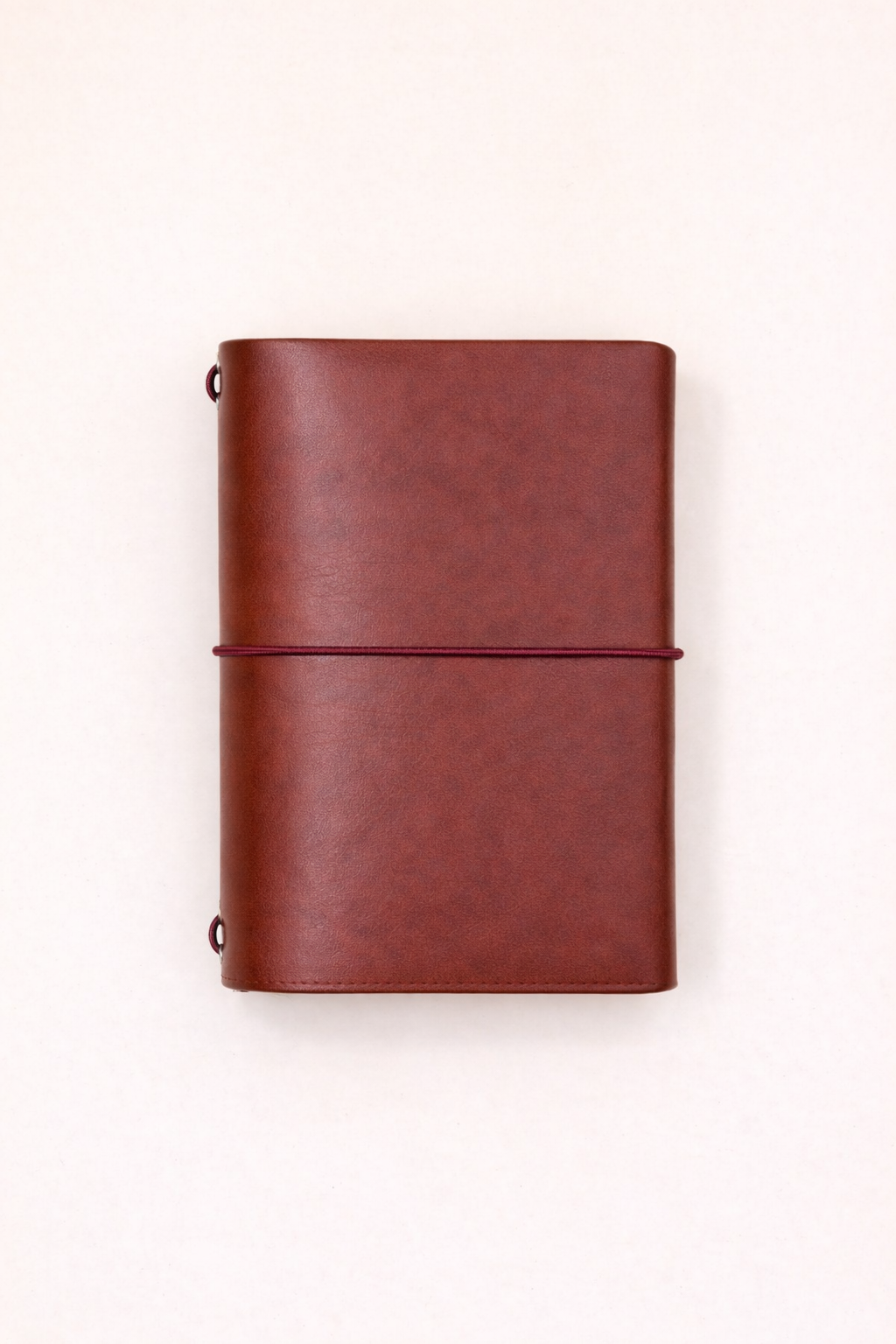 Passport size (B7) leather tri-fold journal cover in colour Cognac