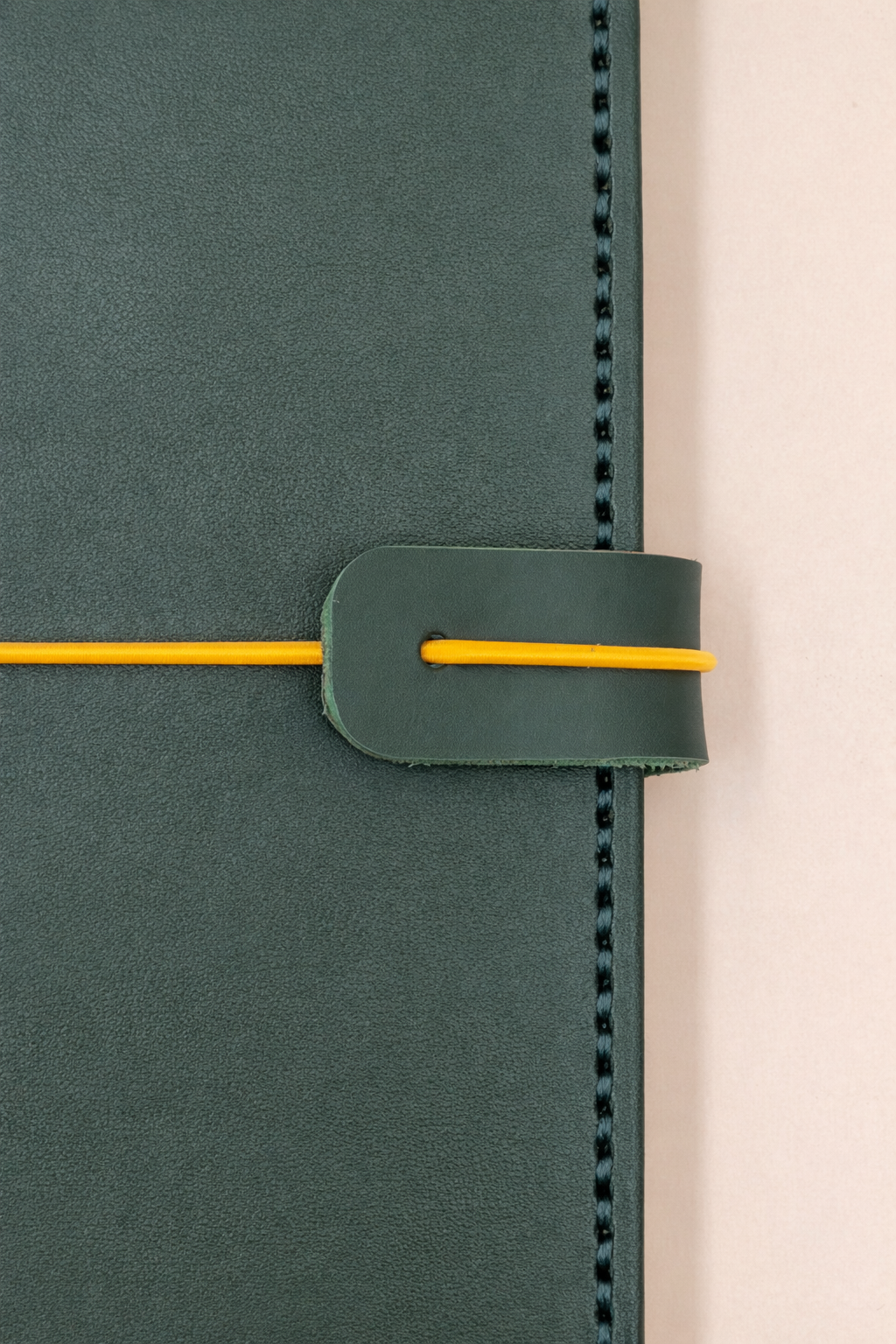A5 leather journal cover Forrest Green colour closing cord and strap view