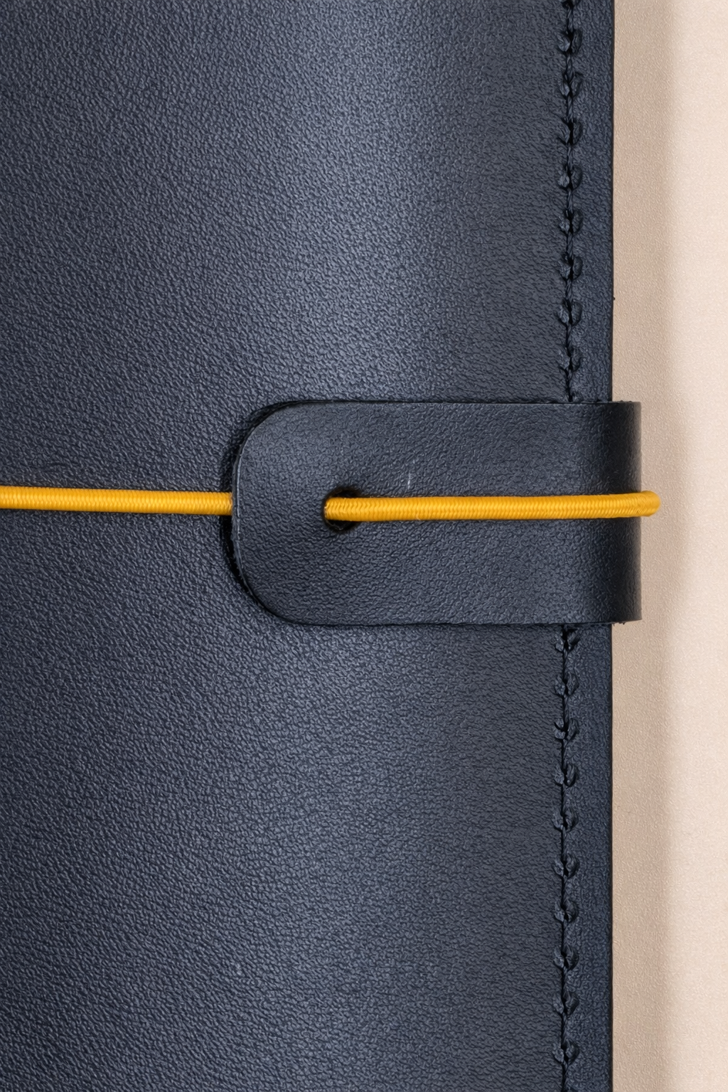 Traveller's (Traverller's Notebook) size leather journal cover Jet Black colour detailed front view with closure cord and strap