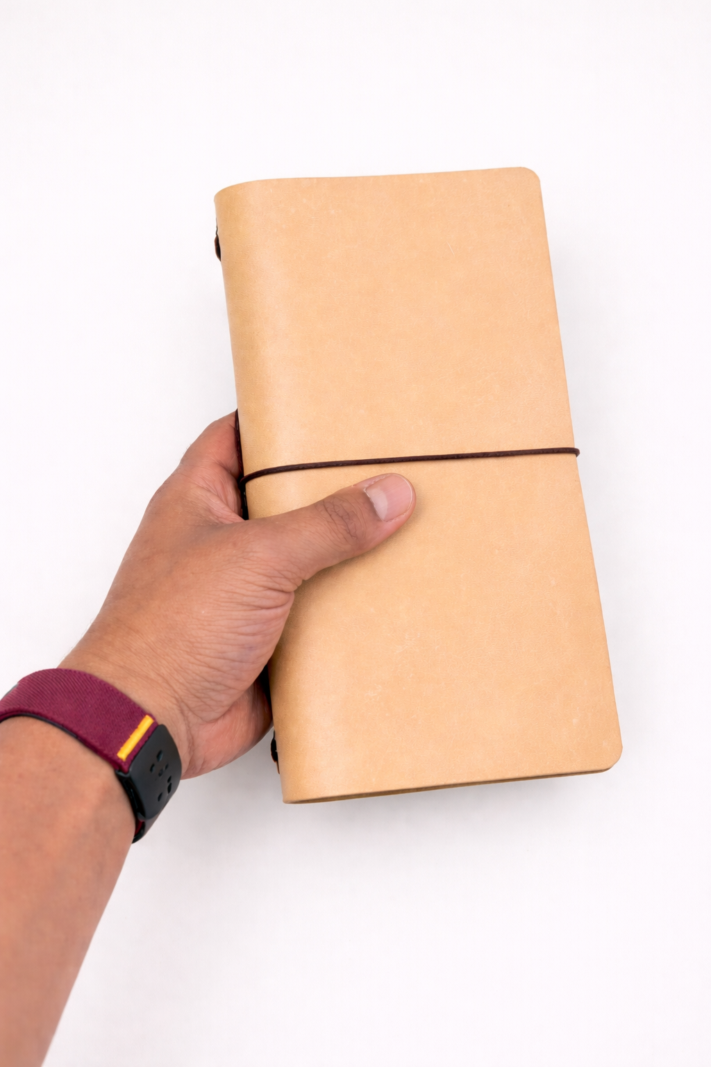Traveller's (Traverller's Notebook) tri-fold size leather journal cover Beach Sand / Tan colour held in hand